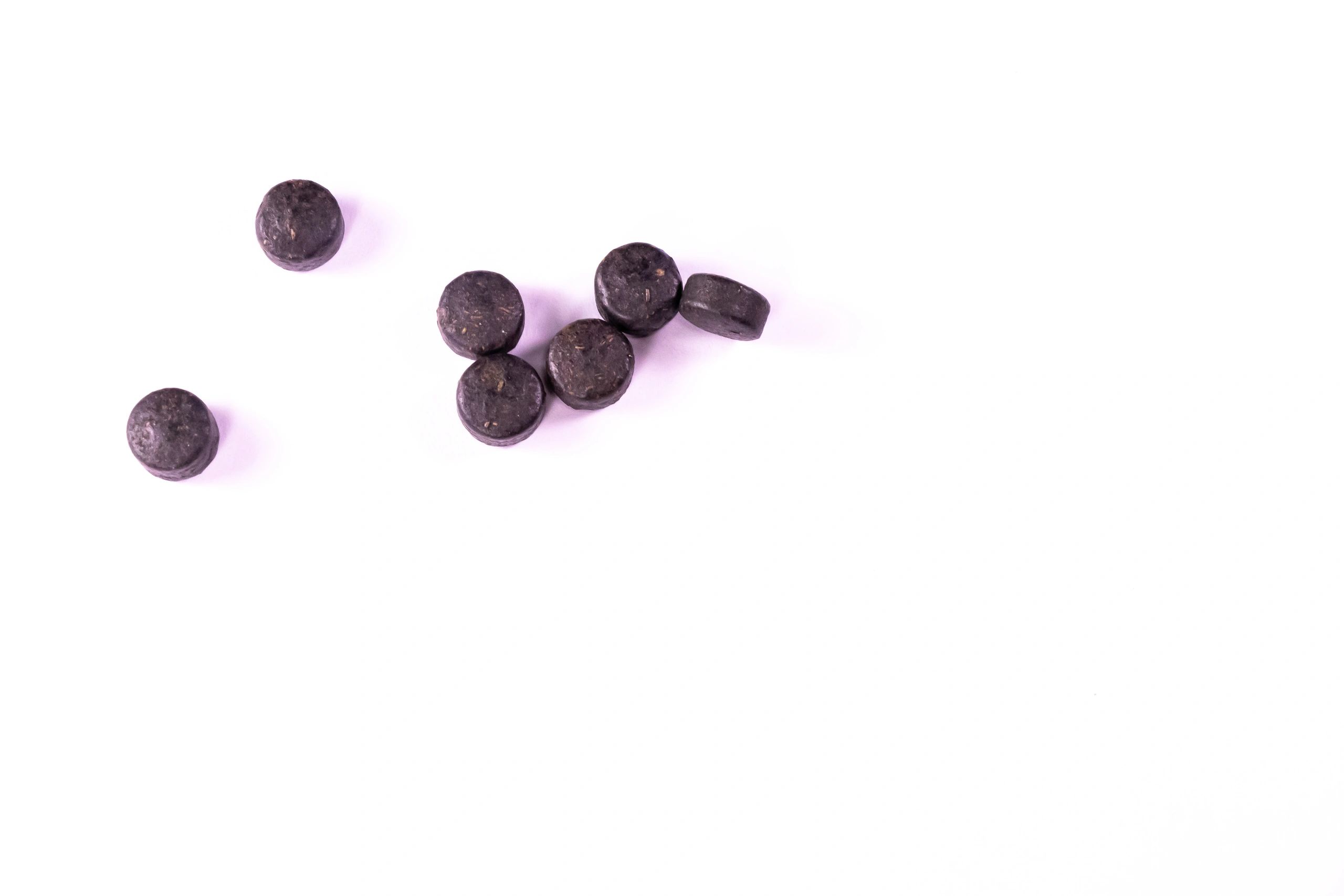 Supplement capsules on a clean white background