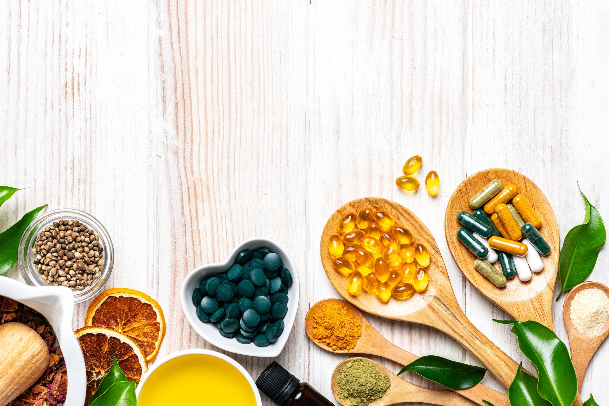 Nutritional supplements and wellness capsules arranged on a clean surface